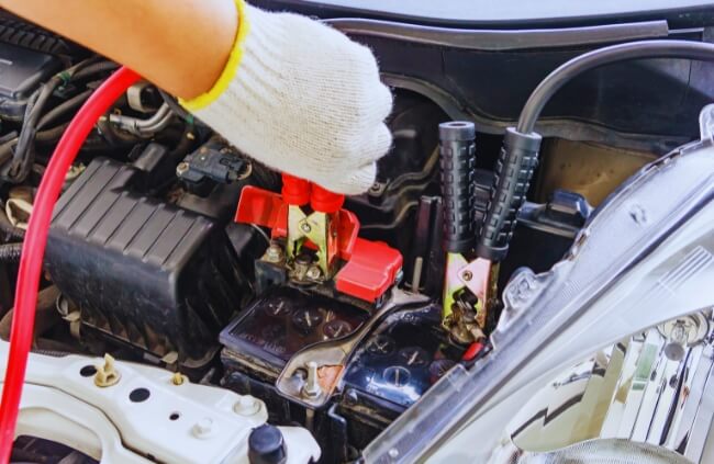 Mobile Mechanic Penrith providing expert mobile mechanic service in Cranebrook, jump starting a vehicle battery.