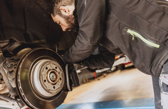Mobile mechanic in Jordan Springs performing brake system repairs delivered by Mobile Mechanic Penrith's mobile vehicle repair team