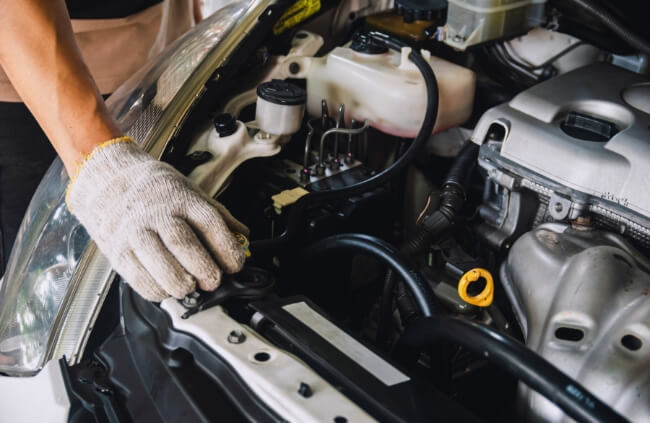 Mobile mechanic in Kingswood inspecting engine components during routine car service with Mobile Mechanic Penrith delivering expert car repair at your location